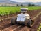 An autonomous farming robot in a field