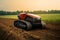 Autonomous tractor working on the field. Smart farming