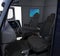 Autonomous truck interior with black seats and wall mounted monitor