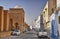 Autos near ancient Great Mosque, Kairouan, Sahara Desert, Tunisia, Africa