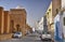 Autos near ancient Great Mosque in Kairouan, Sahara Desert, Tunisia, Africa, HDR