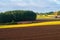 Autumn agricultural landscape, tractor on a farmer field