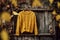 Autumn allure, Trendy yellow knit jumper with price tag, rustic background