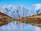 Autumn alpine Kleiner Paarsee or Paarseen lake, Land Salzburg, Austria. Alps Hochkonig rocky mountain group view in far