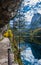 Autumn alpine view. Peaceful mountain lake with clear transparent water and reflections and ferrata stairs. Gosauseen or Vorderer