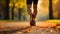 Autumn Ambiance: Male Runner\\\'s Legs in Park.