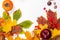 Autumn art composition - varied dried leaves, pumpkins, fruits, rowan berries on white background. Autumn, fall