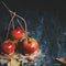 Autumn background with copy space. Traditional caramel apples with twig sticks.