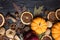 Autumn background with dried fruits, oranges, apples, nuts, anise, mushrooms, acorns and pumpkin.