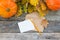 Autumn background. Hygge style autumn flatlay composition with letter, craft envelope, blank paper card, leaves