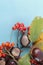 Autumn background. Leaves, chestnuts, dried leaves, rowan berries on pastel blue background. Autumn, fall concept. View from above