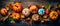 Autumn background of pumpkins and leaves for Thanksgiving and Halloween, on a dark wooden table. View from above