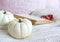 Autumn in bed composition. White pumpkins, plaid, rowan berries and old book. Linen background. Thanksgiving, Halloween holiday