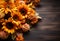 Autumn bouquet of sunflowers on a wooden background