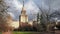 Autumn campus of famous Russian university with bare trees under dramatic sky