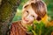 Autumn children. A boy in an autumn Park with a bouquet of leaves. A child walks in the Park. Cute boy playing with maple leaves