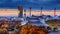 Autumn cityscape - view of the Olympiastadion at sunset in the Olympiapark of Munchen