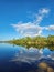 Autumn cloudscape over Pine Glades Lake in Everglades National Park.