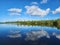 Autumn cloudscape over Pine Glades Lake in Everglades National Park.