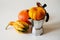 Autumn coffee concept. Moka pot with pumpkins. Isolated