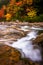 Autumn color and cascades on the Swift River, along the Kancamagus Highway in White Mountain National Forest, New Hampshire.