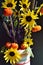 Autumn colors bouquet orange pumpkin yellow sunflower brown millet grass purple filler vertical