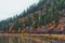 Autumn colors dot hillside along Klamath Lake