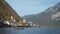 Autumn colors in famous tourist destination idyllic town Hallstatt in Austrian mountains Alps.