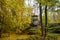 Autumn colors in the National Dendrology Park of Sofiyivka, Uman, Ukraine. A gazebo on the edge of a rock