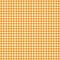 Autumn colors orange vichy check, or gingham, print background. Seamless, or repeat, pattern. Fabric texture visible.