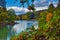 Autumn colors showing at Mirror Pond near Bend, ORegon