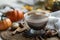 Autumn composition with a cup of hot drink close-up.