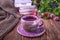 Autumn composition. Fruit tea, books, knitted sweater and flowers asters on a wooden background. Free space