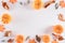 Autumn composition. Orange pumpkin with autumn leaves on white background. Flat lay, top view copy space