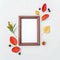 Autumn composition photo frame, colorful leaves on white background