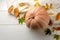 Autumn composition with yellow leaves and a warm scarf and pumpkin. autumn time. on a white wooden table.