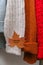 Autumn concept. Fall maple leaf with text AUTUMN MOOD on cozy warm sweater. Knitted woolen and mohair sweaters. Hygge