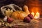 Autumn concept of pumpkins, red apple, garlic, leaf, straw and b