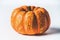 Autumn concept. Various pumpkins on white background with fall leaves, front view. Harvest vegetables , Thanksgiving food