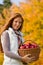 Autumn country - woman with wicker basket