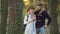 Autumn couple posing in park. Romantic autumn couple posing on nature background. Passion dating and love. Romantic