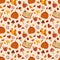 Autumn cozy seamless pattern with falling leaves and pumpkins. Infinite vector background