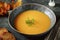 Autumn cream soup made from organic vegetables - pumpkin, sweet potato, carrot and turnip.