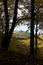 Autumn czech nature view to the hills through the trees