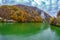 Autumn at the Danube Gorges and Decebal king Head sculpted in rock