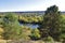 Autumn decoration of vegetation along the banks of the Ural river Iren. Sunny autumn in the foothills of the Western Urals.