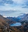 Autumn Dolomites mountain scene from hiking path betwen Pordoi Pass and Fedaia Lake, Italy. Snowy Marmolada Glacier and Fedaia
