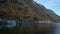 Autumn fall in famous tourist destination serene town Hallstatt in mountains Alps. Austria