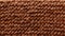 Autumn fall knitted wool fabric texture background. Merino wool brown earthy tones handmade knitted background