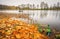 Autumn. Fall reflections in a lake with a boat